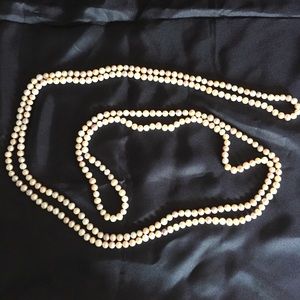 Long endless fresh water pearls necklace